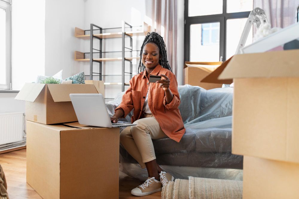 Seller managing orders on laptop